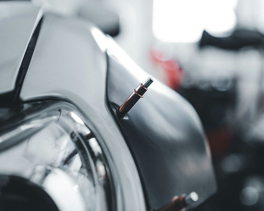 SMART repair technician performing precision spot repair on prestige vehicle — Miranda Auto Body Sydney